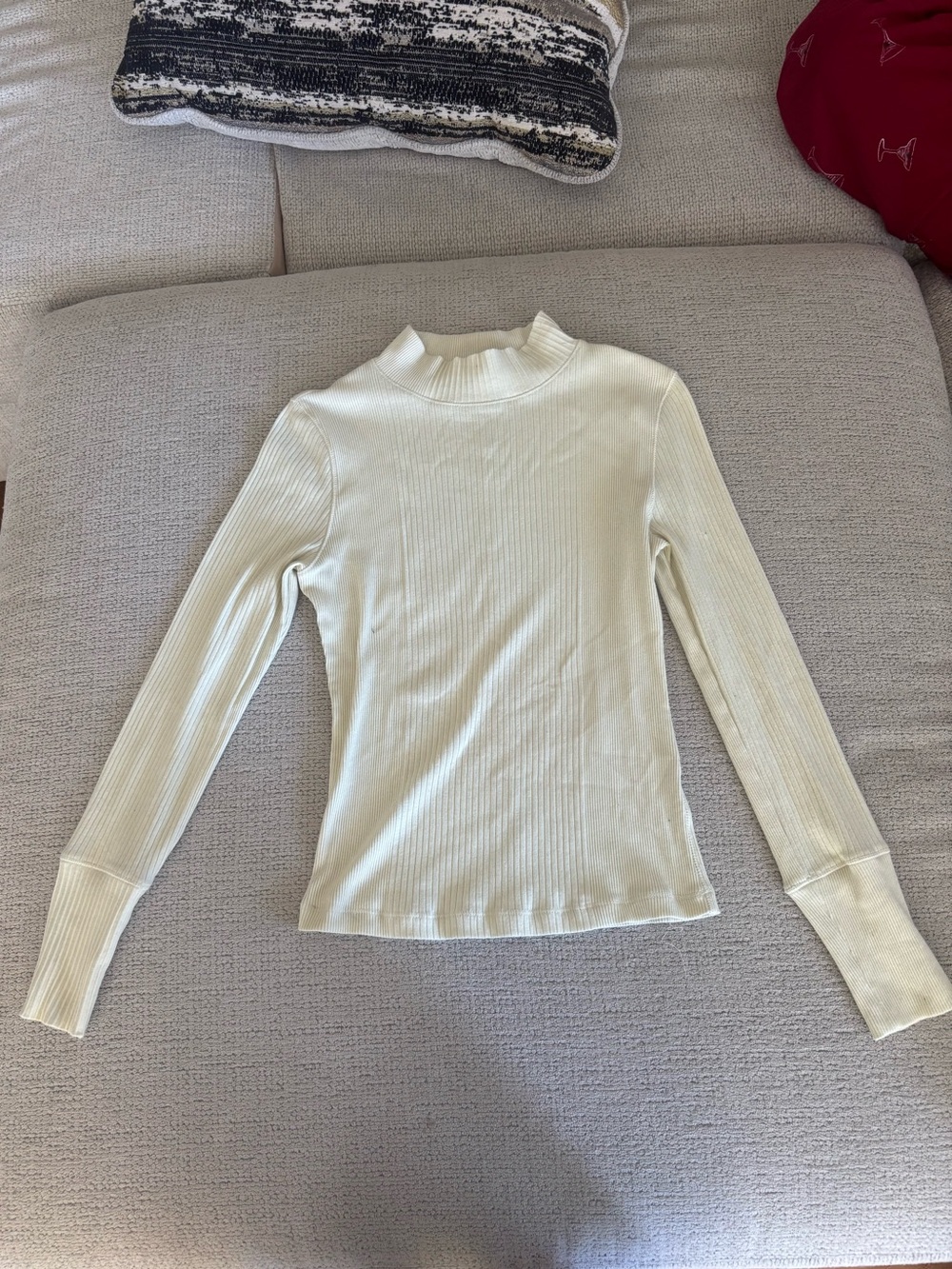 Cream colored turtle neck